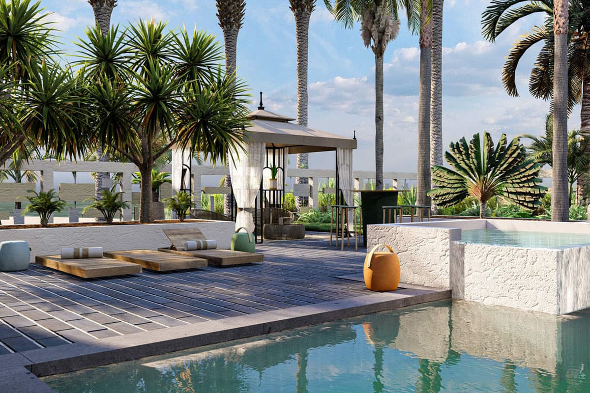 Patio with lounge chairs, cabana, and pool surrounded by palm trees.