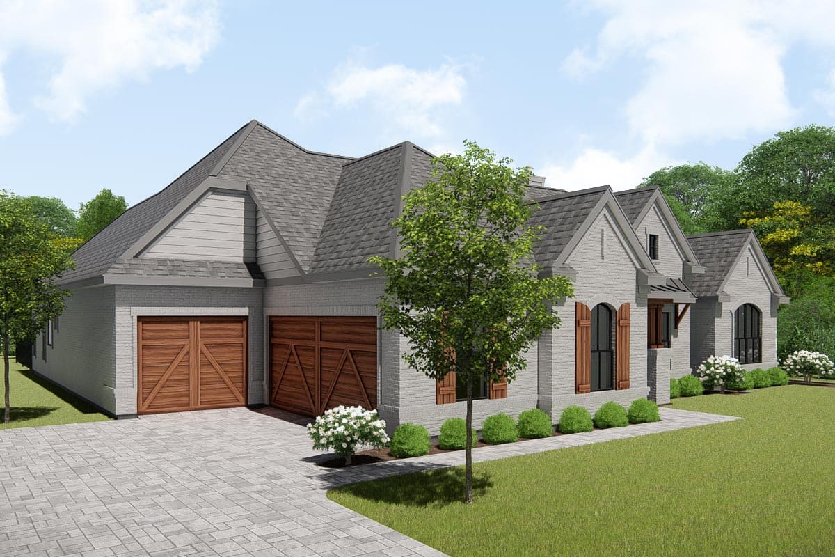 House plan exterior: Modern Farmhouse style, one story, with a pitched roof, triple gable, and two-car garage.