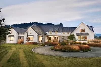Modern Farmhouse Plan with Cathedral Ceiling above Living Space