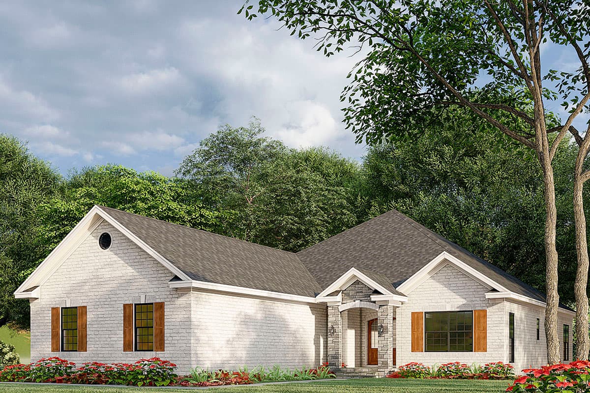 One-story house plan exterior with white brick, stone-accented gabled entrance, wood shutters, and a circular gable vent.