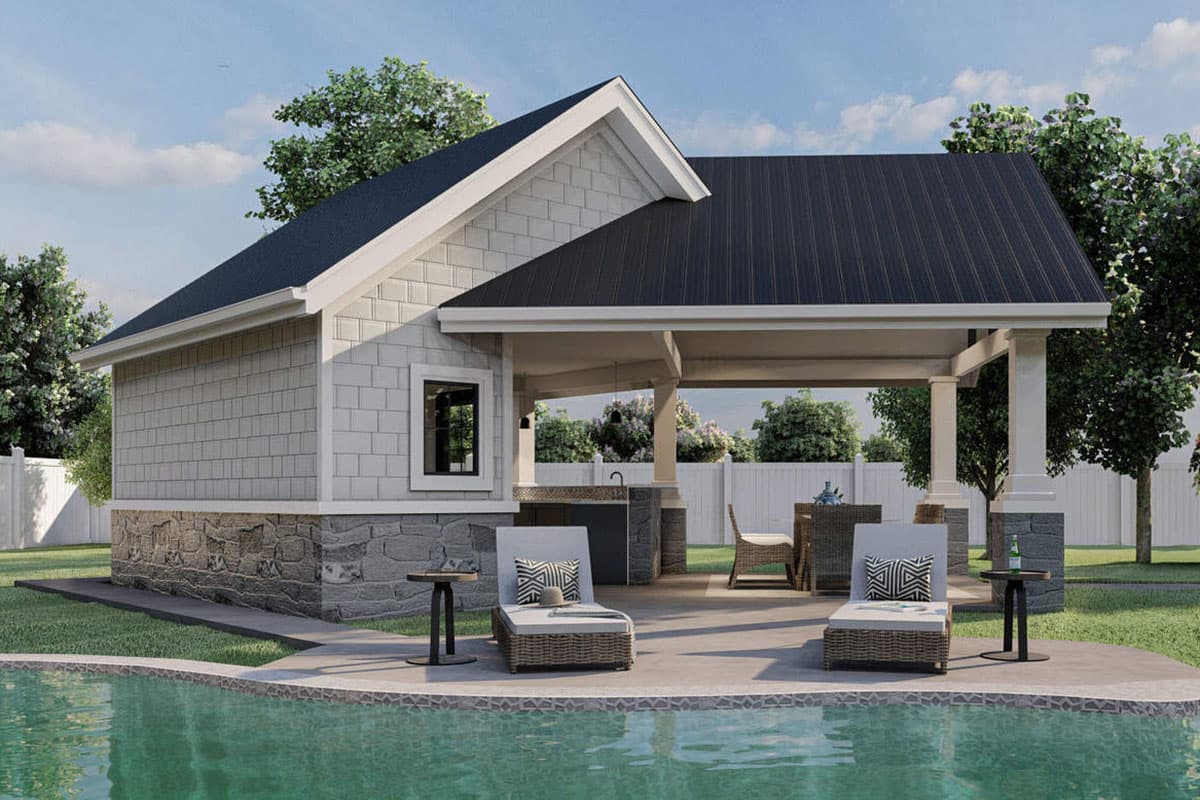 House plan exterior featuring shake siding, stone foundation, gabled roof, and covered outdoor living area with kitchen.