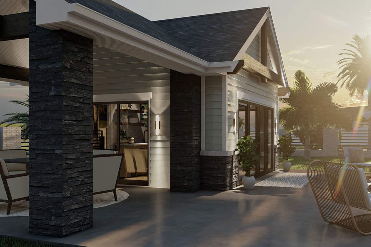 House plan exterior with stacked stone accents on pillars, horizontal siding, and gable rooflines.