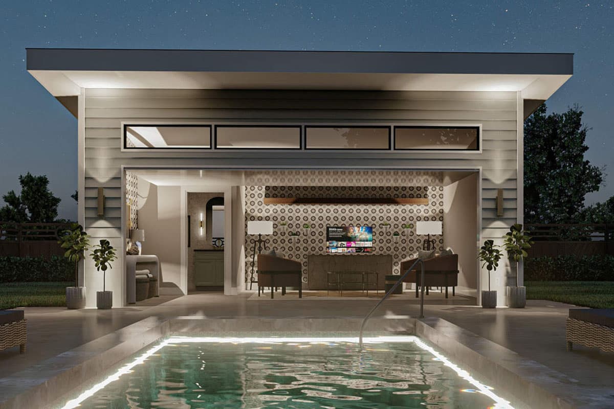 Modern outdoor room with sliding glass doors, patterned accent wall, television, and seating, adjacent to a pool.