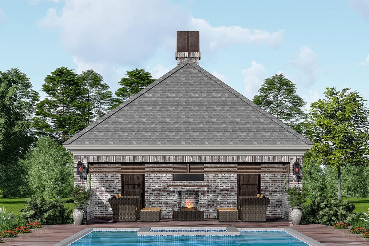 House plan exterior. One-story structure with gabled roof, brick facade, chimney, and an outdoor fireplace area with pool.