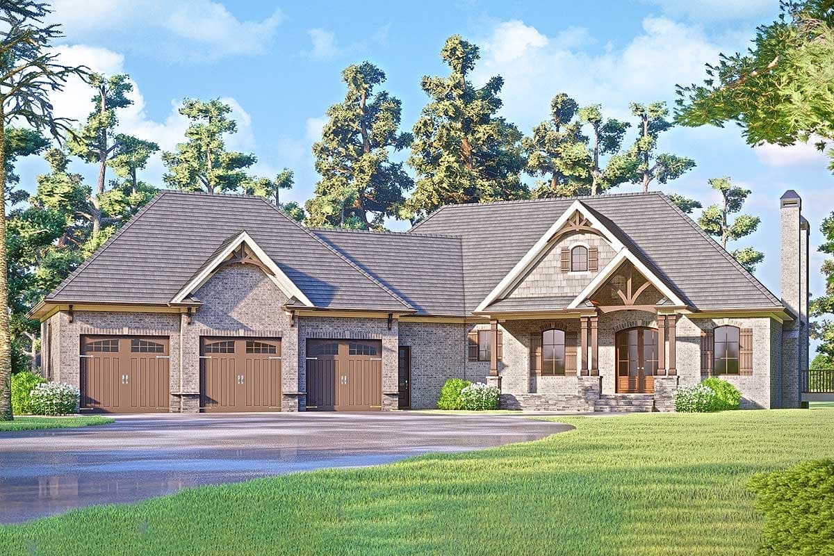 House plan exterior with a brick facade, three-car garage, covered entry with decorative brackets, gabled dormer and stone accents.
