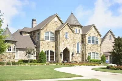 Luxury Two-story Home Plan with 4 Garage Bays