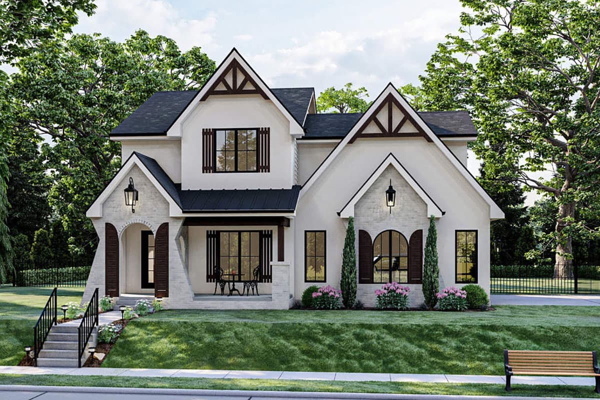 House plan exterior. Two-story home with a gabled roof, prominent gables, and a covered front porch with arched entry.