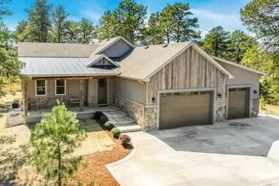 Hillside Craftsman with Barnwood-accented Exterior and a 3-car Garage