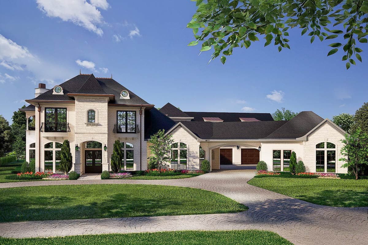 House plan exterior with a two-story main section, stone facade, arched entryway, balconies, and a three-car garage.