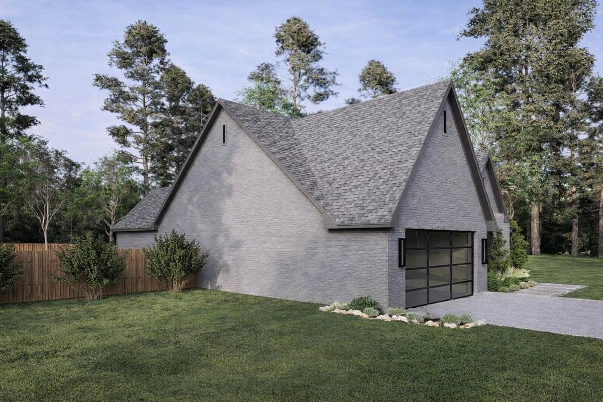 House plan exterior with gray brick, steep gables, and modern glass garage door.