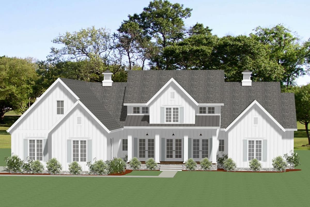 House plan exterior. Two-story Modern Farmhouse with gabled roof, front porch with columns, and dormers. Features symmetrical facade and shutters.