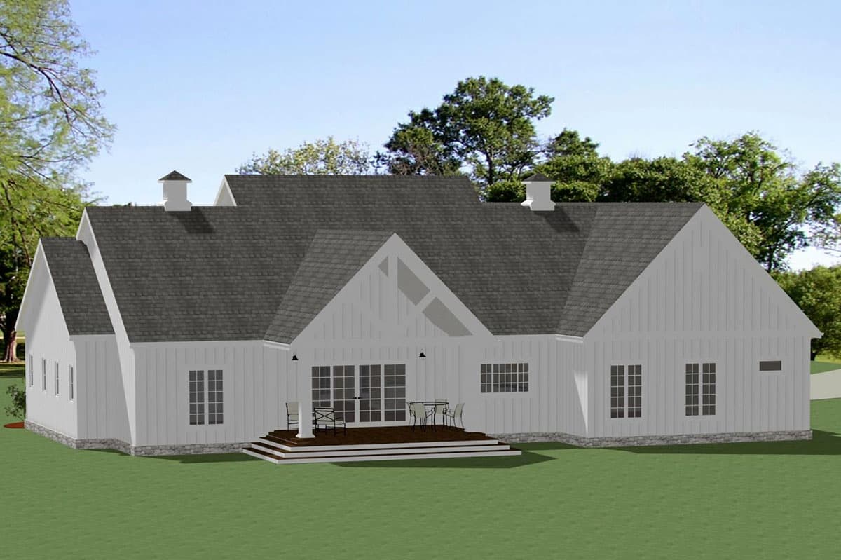 House plan exterior: Modern Farmhouse style, one story, with gables, multiple windows, and a rear deck.