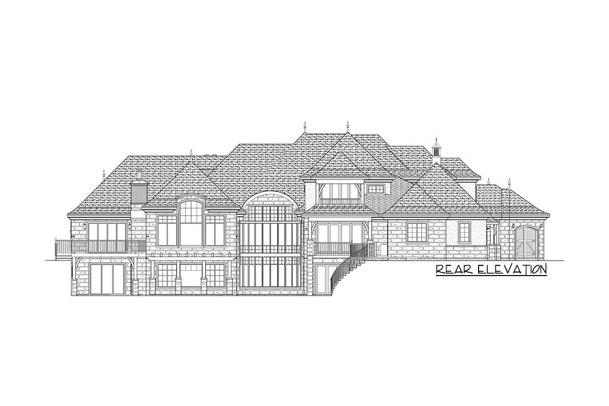 Rear elevation drawing of a large house with multiple gables, dormers, balconies, and a carriage house style garage door.