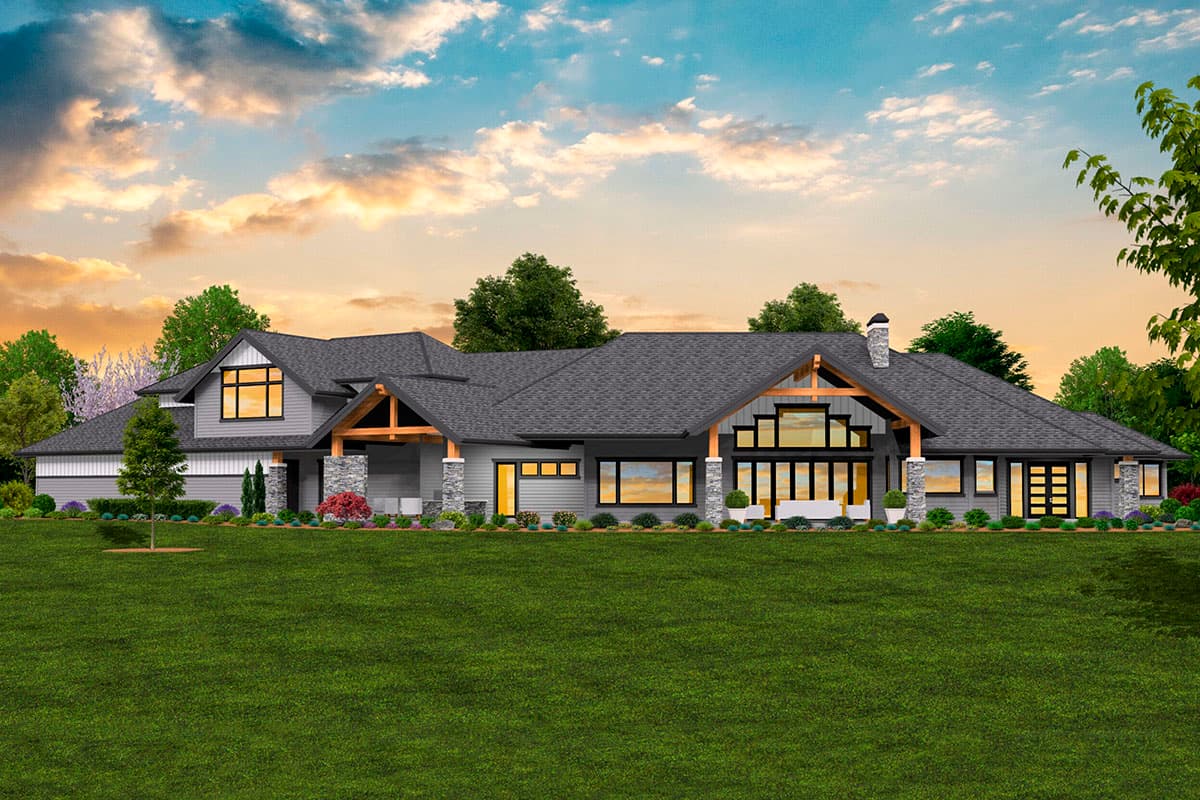 Modern Ranch house plan exterior with gables, exposed beams, stone accents, and large windows.