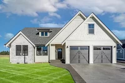 One-and-a-half-story Craftsman House Plan with Split Bedrooms and Vaulted Great Room