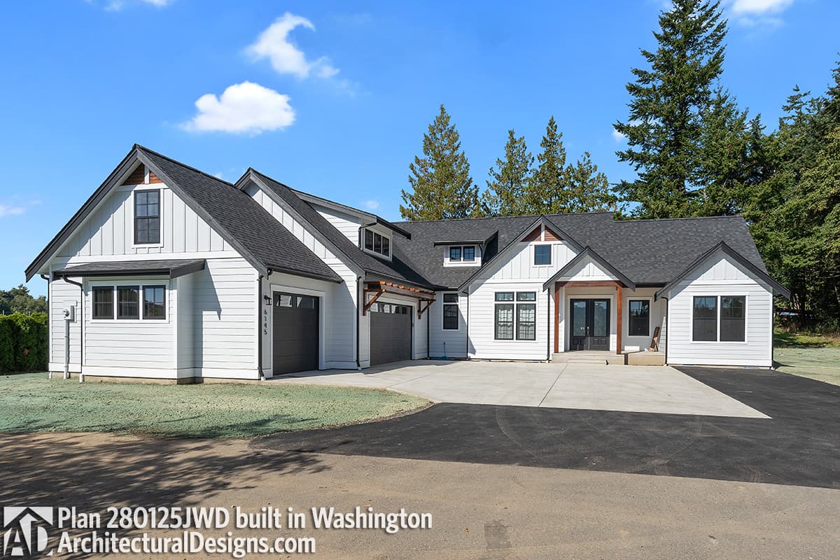 Modern Farmhouse house plan exterior with two garages, gables, dormers, and a covered entry.