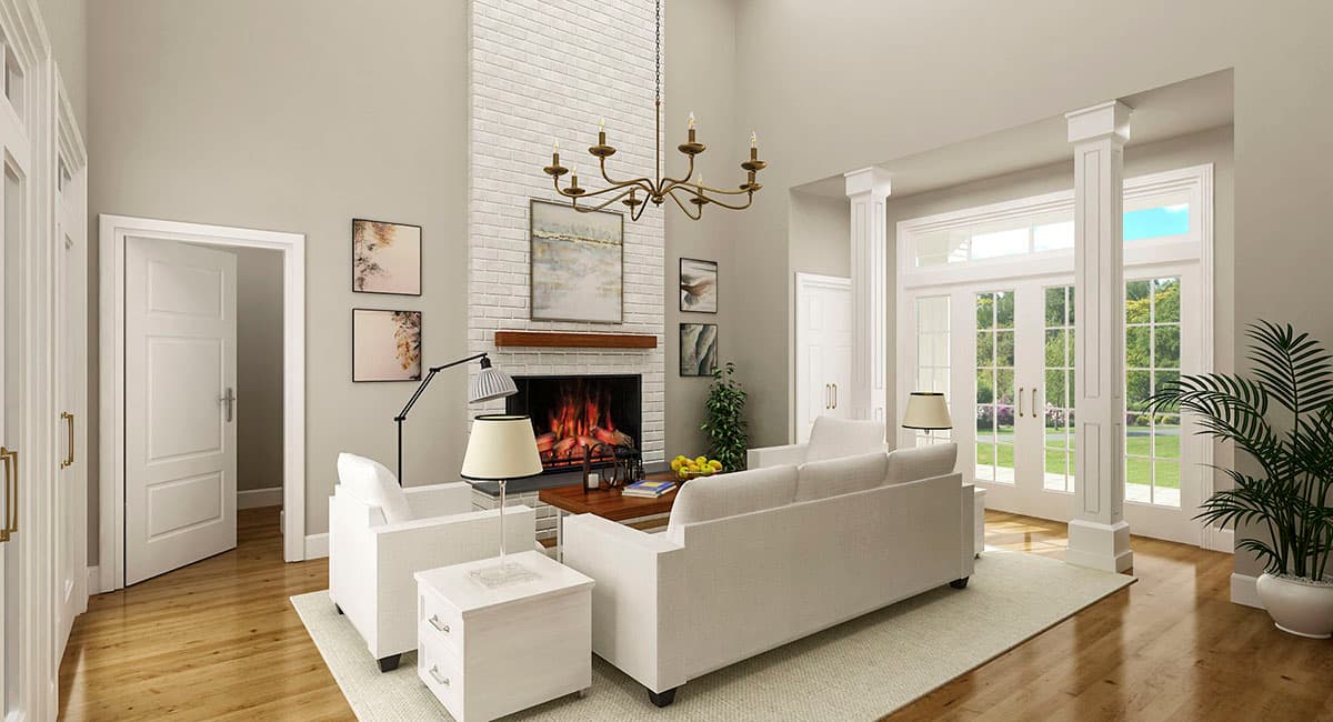 Great room with a soaring white brick fireplace, wood mantel, and a chandelier. Double doors open to the exterior.