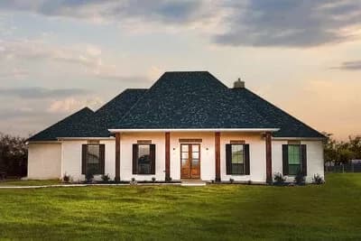 Modest Sized Acadian House Plan with Large Rear Porch