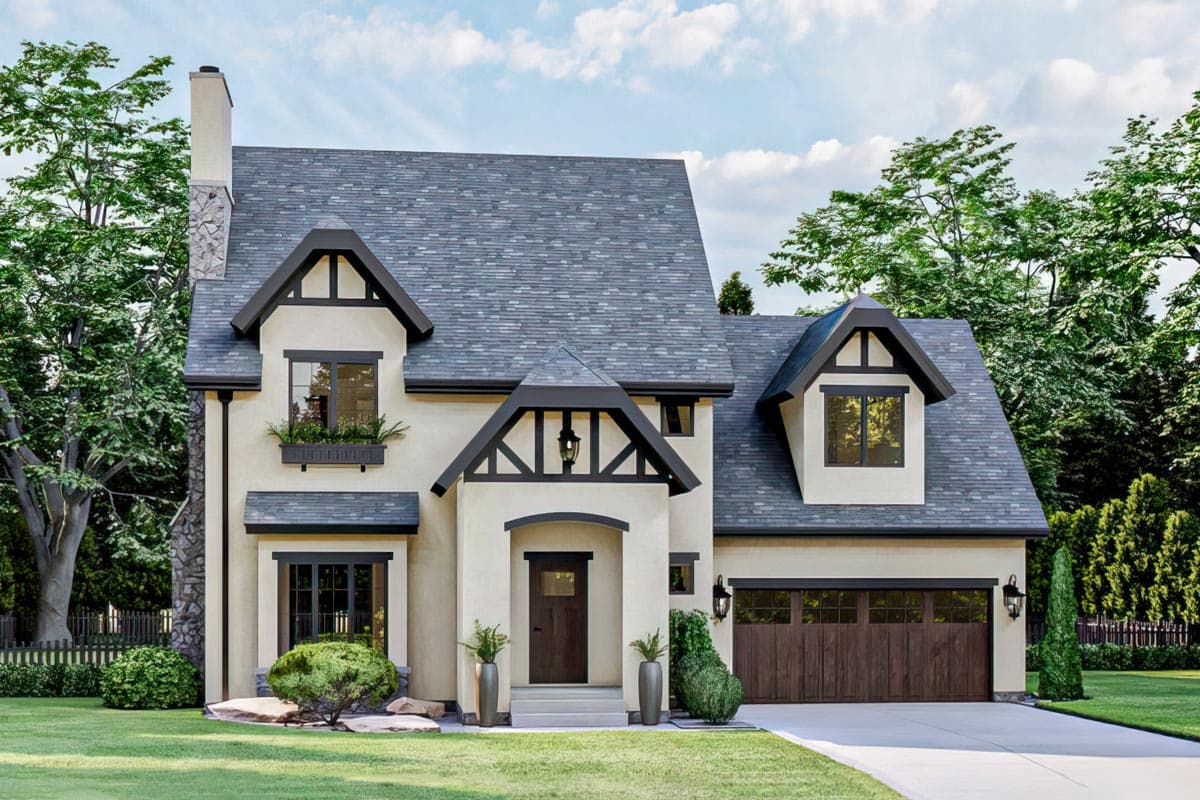Two-story house plan exterior with stone chimney, gables, prominent dormers, covered entry, and attached garage.