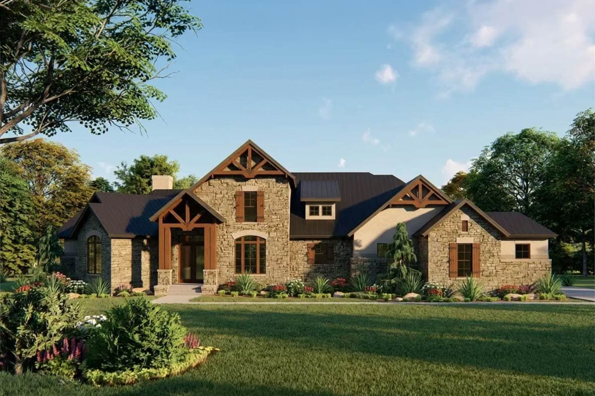 House plan exterior: Stone two-story residence with dark metal roof, exposed timber gable brackets, and covered entry.