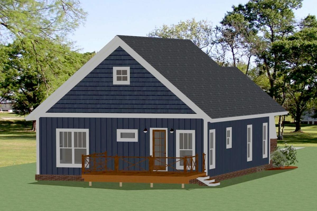 House plan exterior: One-story home with a gable roof, dormer window, and a wrap-around deck.