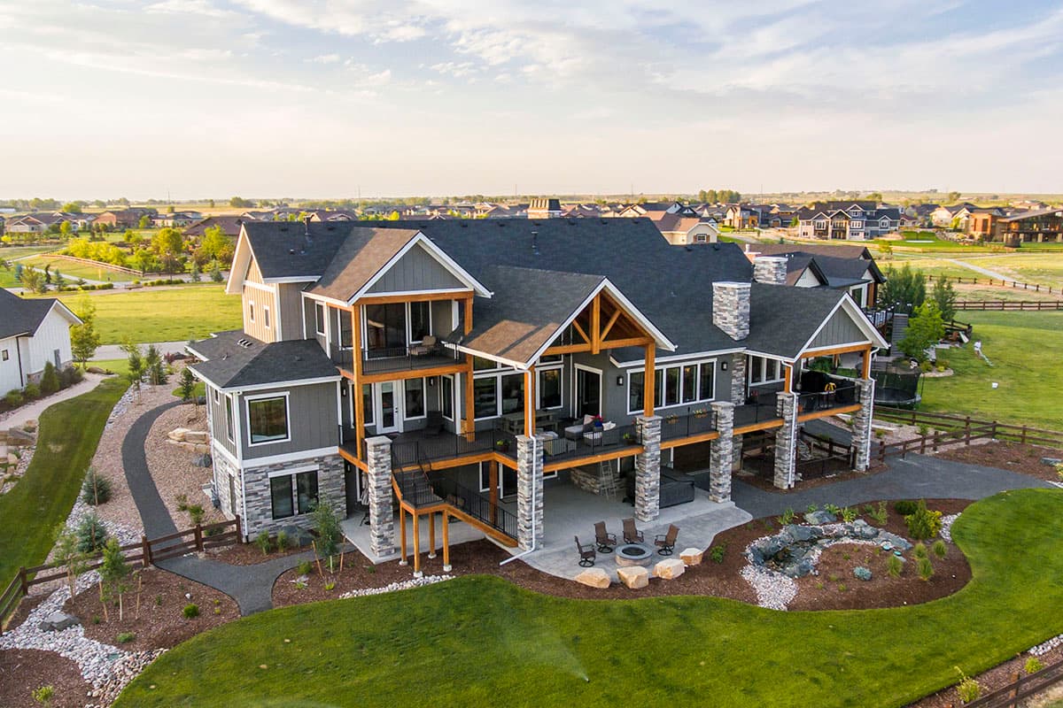 Plan 95100RW: Craftsman with 4-Car Garage and 2-Story Family Room and an Upstairs Office - 3456 Sq Ft - Image #6 - Craftsman, Mountain, Rustic
