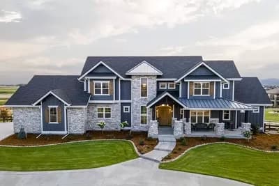 New American Mountain Home Plan with First-floor Master Suite and Den