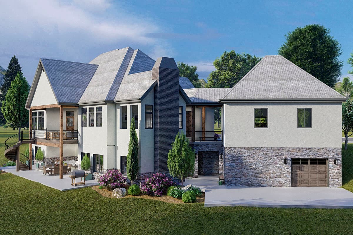 House plan exterior showing a two-story home with stone foundation, gabled rooflines, prominent chimney, and attached garage.