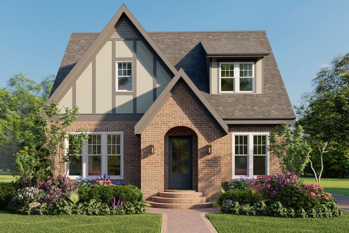 House plan exterior: Two-story Tudor-style home with brick facade, prominent gables, half-timbering, and arched entryway.