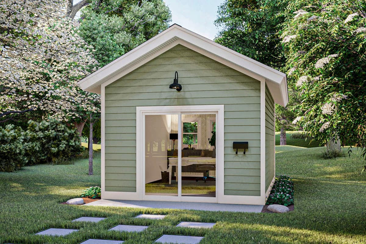 House plan exterior. One-story structure with gabled roof, horizontal siding, and sliding glass door. A small shed-like building.