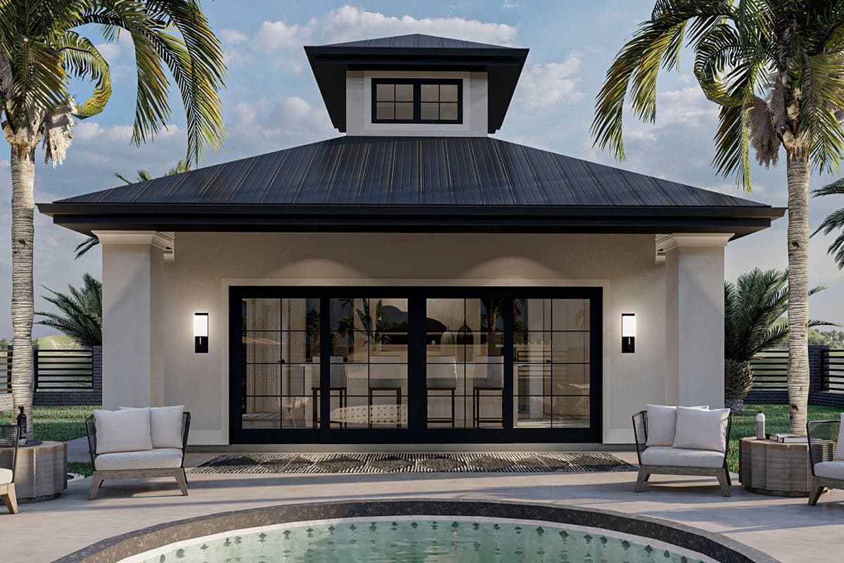 House plan exterior. One-story structure with a metal gable roof, dormer, and large sliding glass doors. Includes a pool and patio furniture.