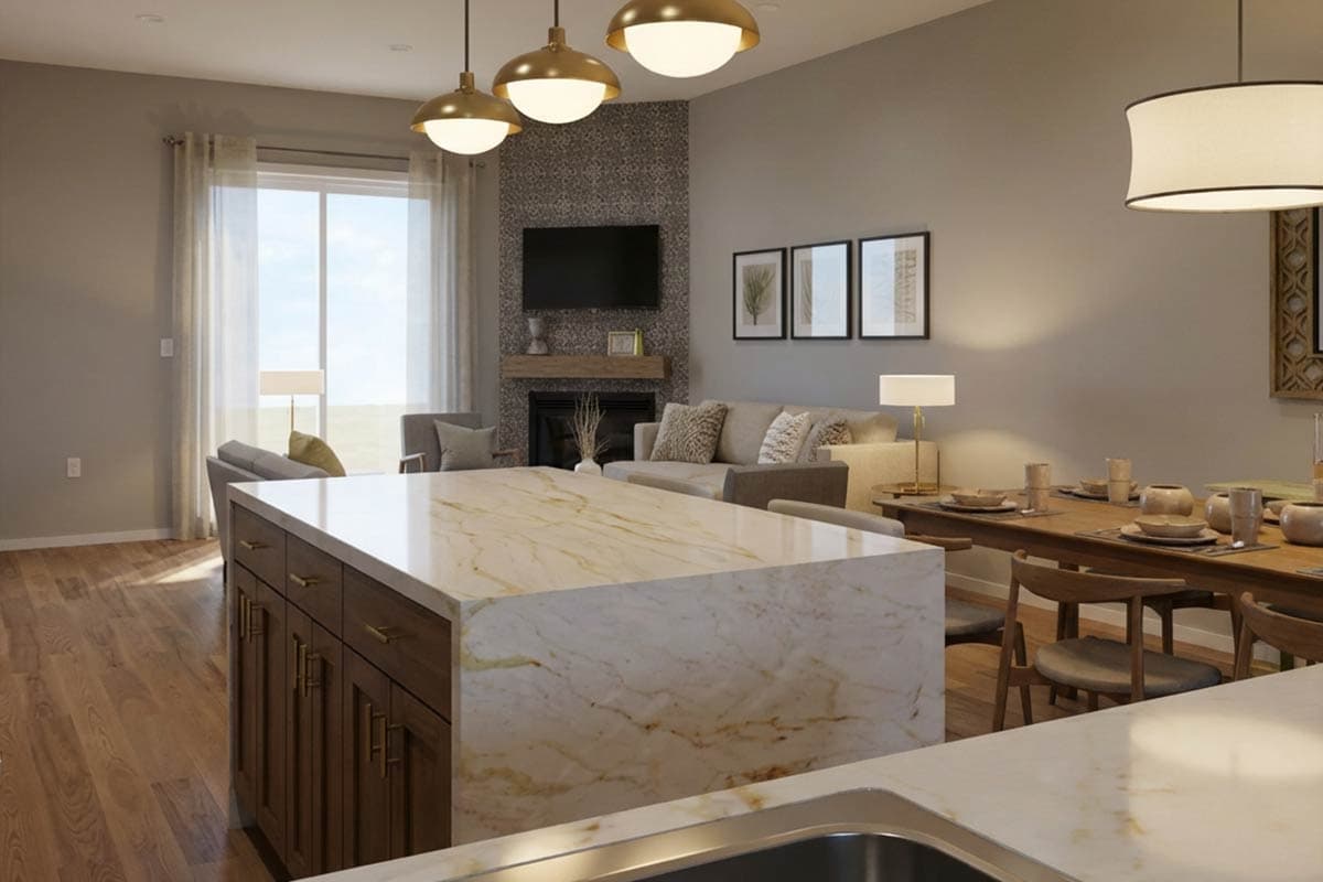 Open concept living area with kitchen island, fireplace, dining table, and large window.