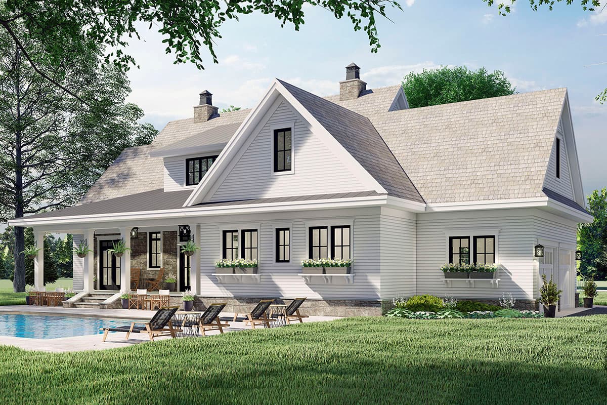 Modern Farmhouse house plan exterior with a wrap-around porch, multiple gables, dormer windows, and a detached garage.