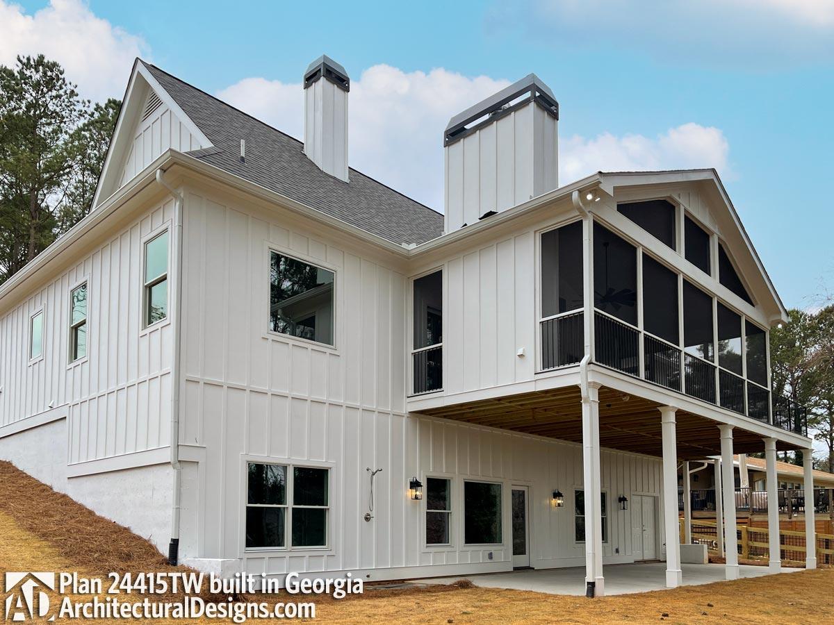 House plan exterior with board-and-batten siding, gabled rooflines, two chimneys, and a screened porch.