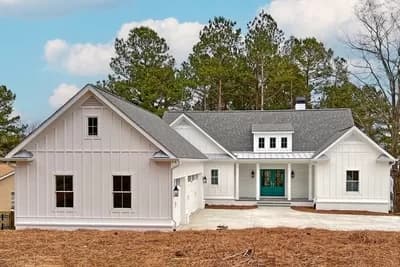 New American Farmhouse Plan with Barn-like 3-car Garage
