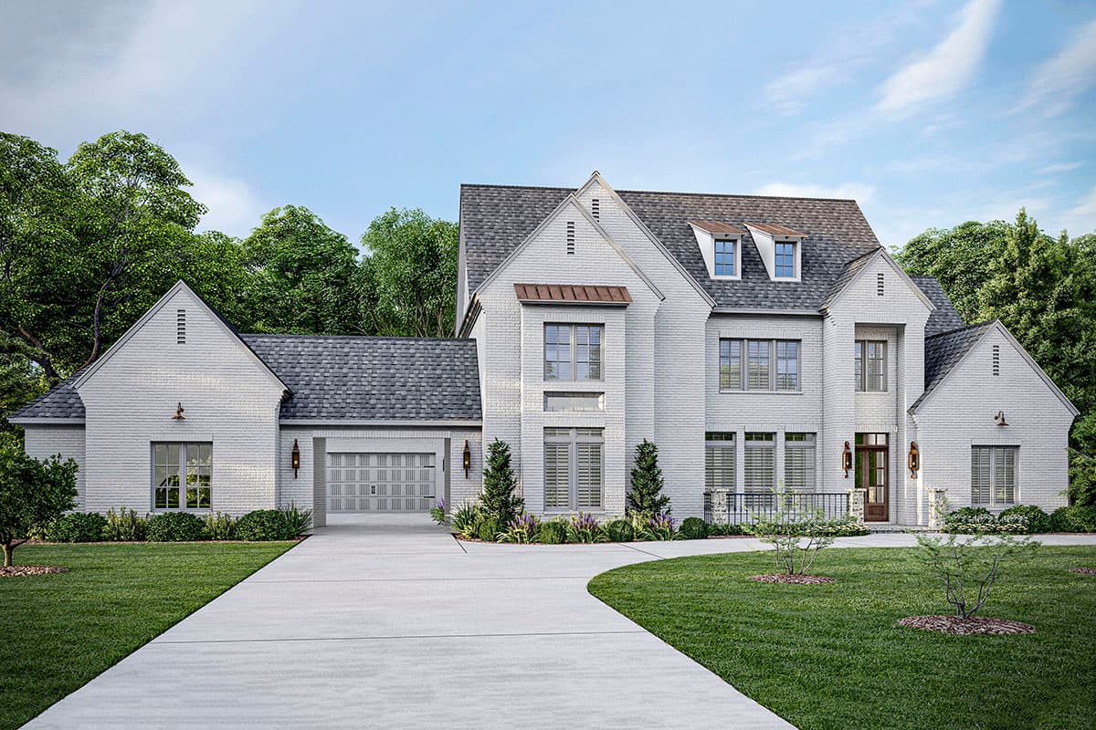 House plan exterior featuring a two-story brick-veneer home. Notable elements include multiple gables, dormers, and a detached garage.