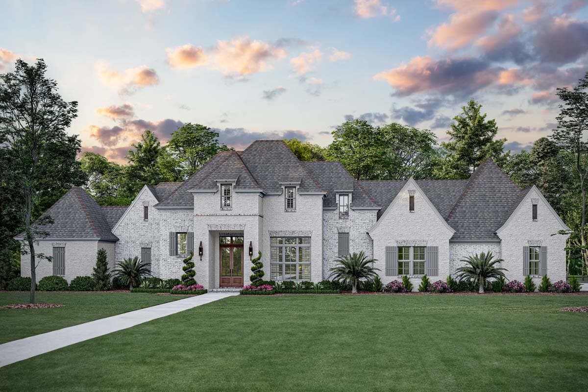 House plan exterior. Two-story home with a gabled roof, brick facade, and multiple dormers. Features a covered entry and symmetrical design.