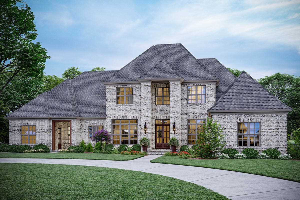 House plan exterior. Two-story brick home with gabled roof, multiple dormers, and a covered front entry. Circular driveway.