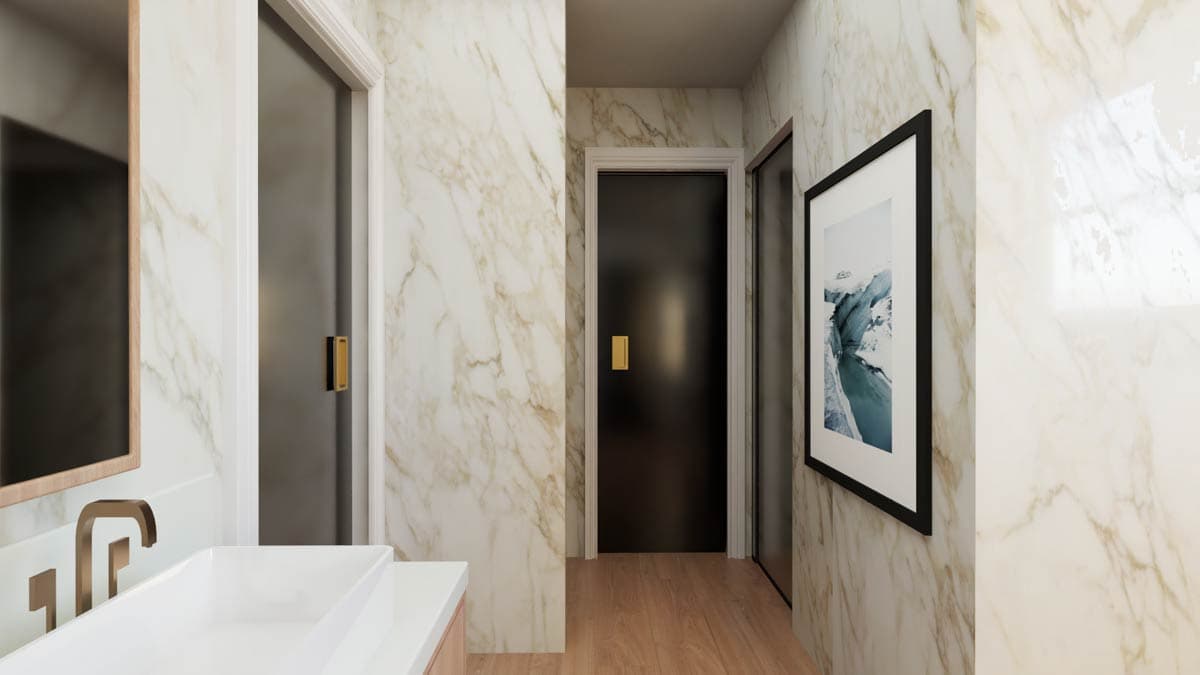 Hallway interior with marble-patterned walls, two doors, and framed artwork.