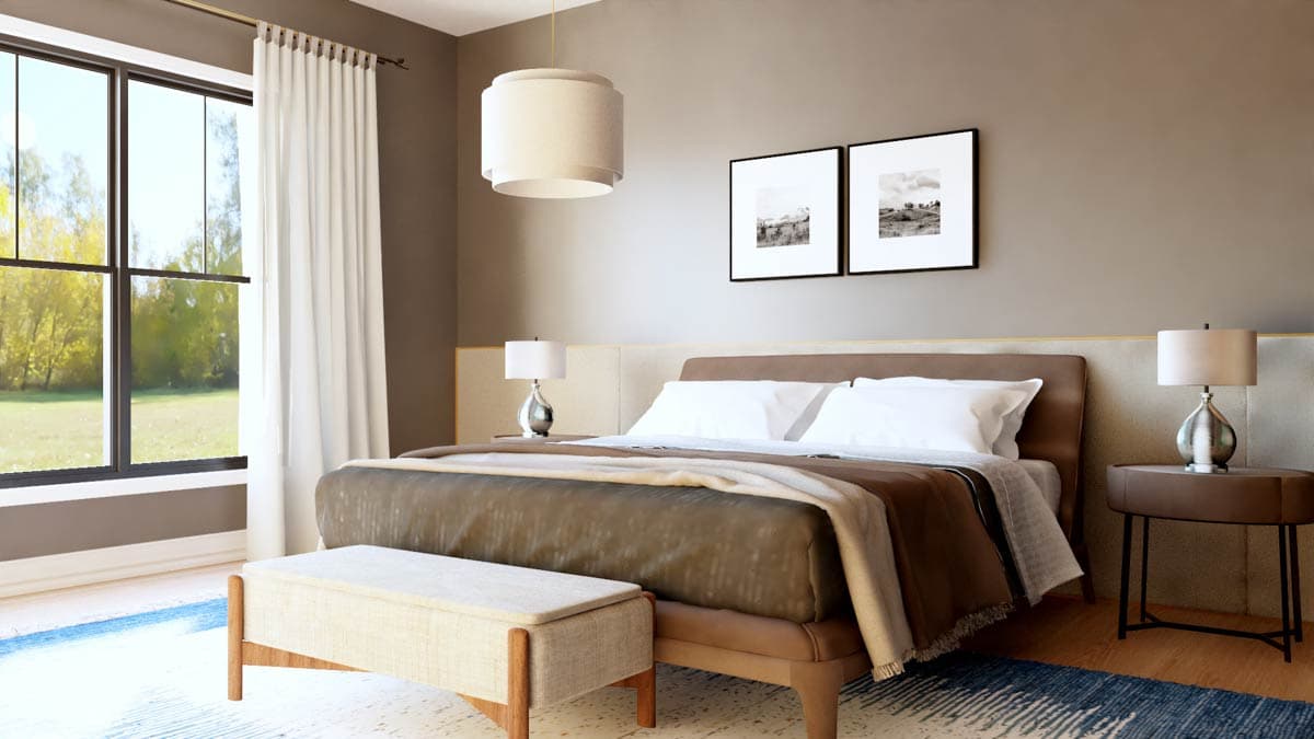 Bedroom with a large window, upholstered headboard, pendant light, and two framed prints.