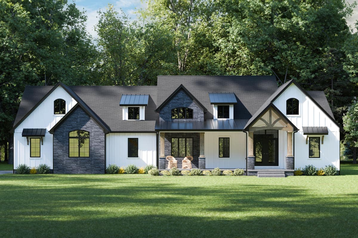 House plan exterior. Two-story Modern Farmhouse with gables, dormers, and a covered porch. Features stone and white siding with black accents.