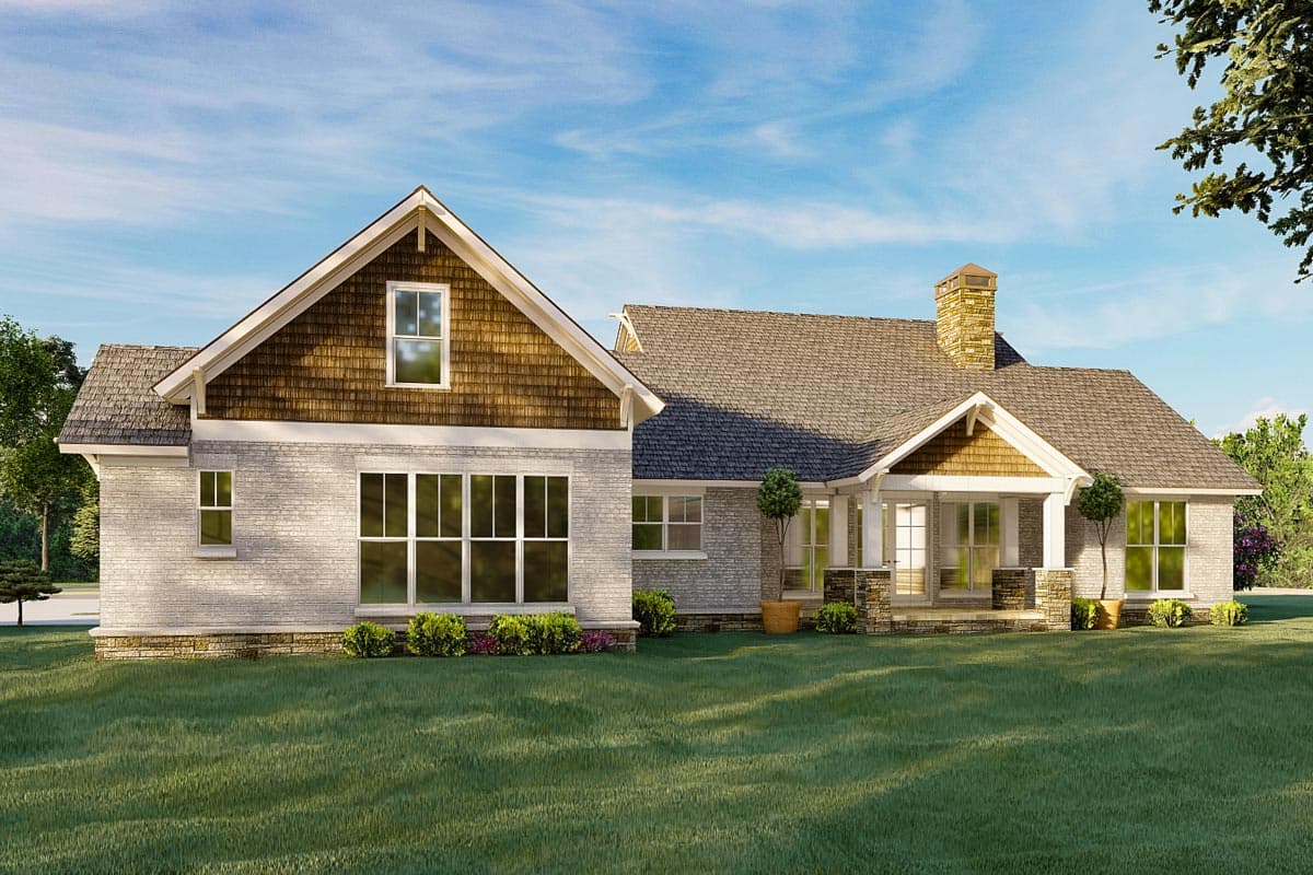 House plan exterior: Modern Farmhouse style, one story, with shingle-clad gable, stone chimney, and covered porch.