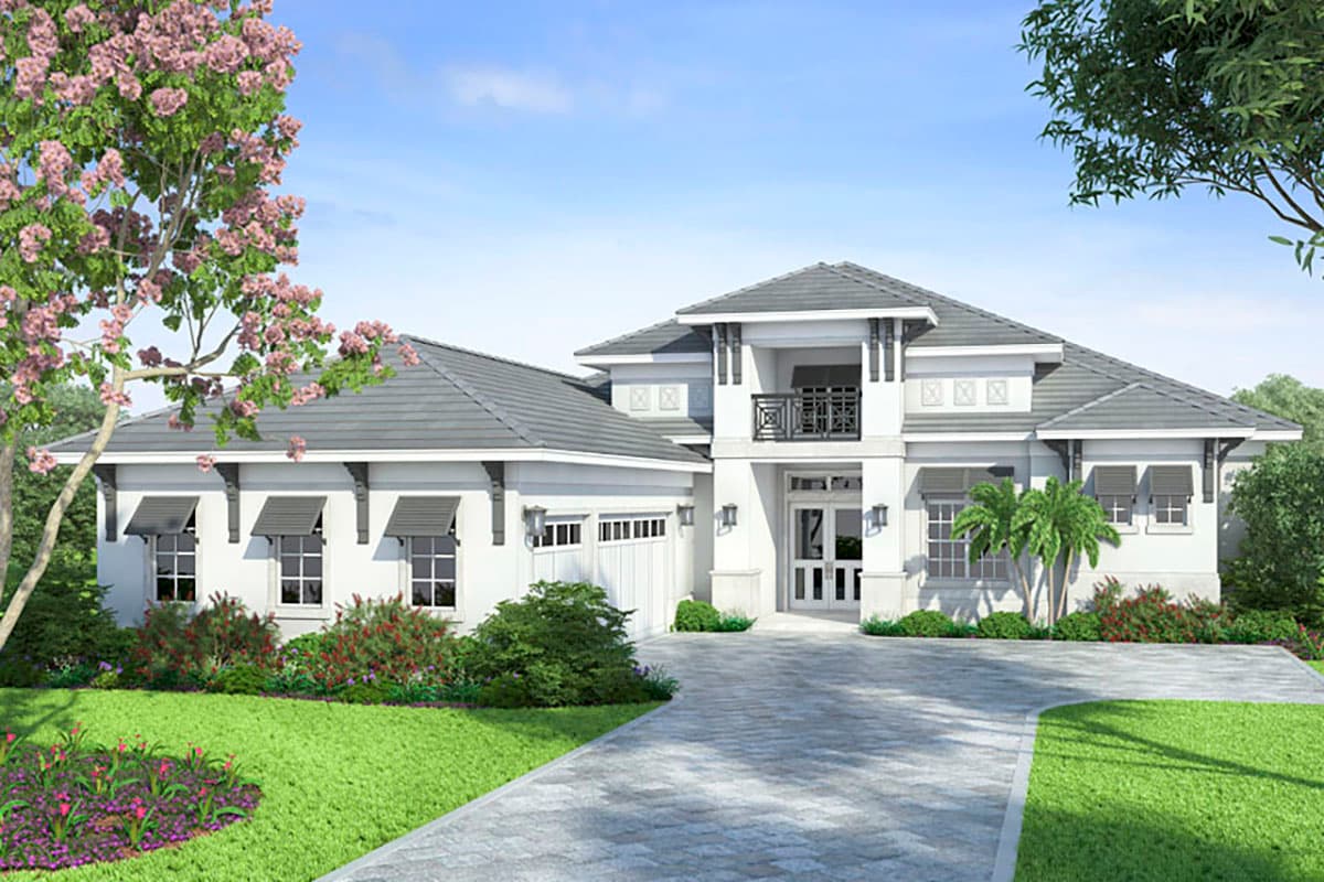 House plan exterior with a two-story design. Features include a front balcony, multiple gables, and a prominent roofline over the entry.