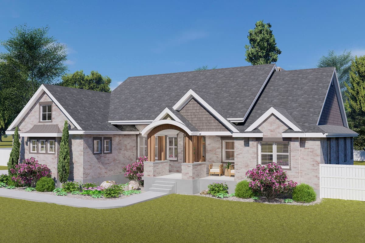 House plan exterior with brick facade, prominent gabled dormers, a covered arched entry porch with wood columns, and multiple rooflines.