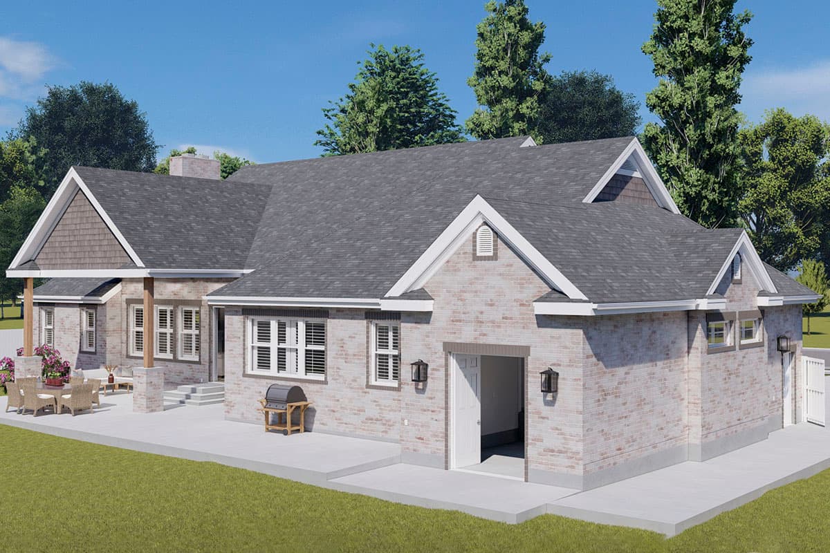 House plan exterior: Ranch style with brick facade, gabled rooflines, covered porch, and side-entry garage.