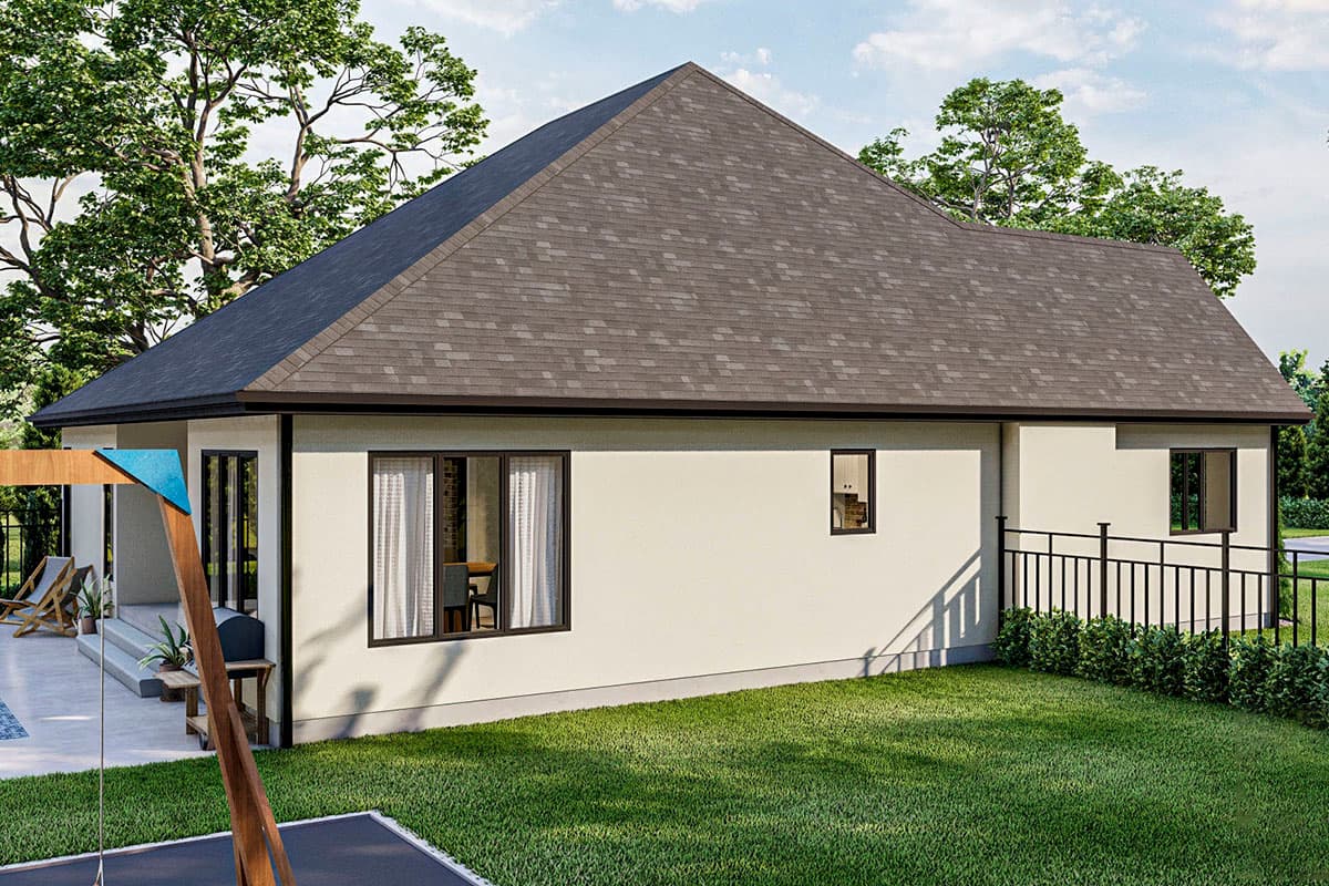 Modern ranch house plan exterior with a prominent hip roof, stucco siding, and multiple windows. Features a covered patio on the left.