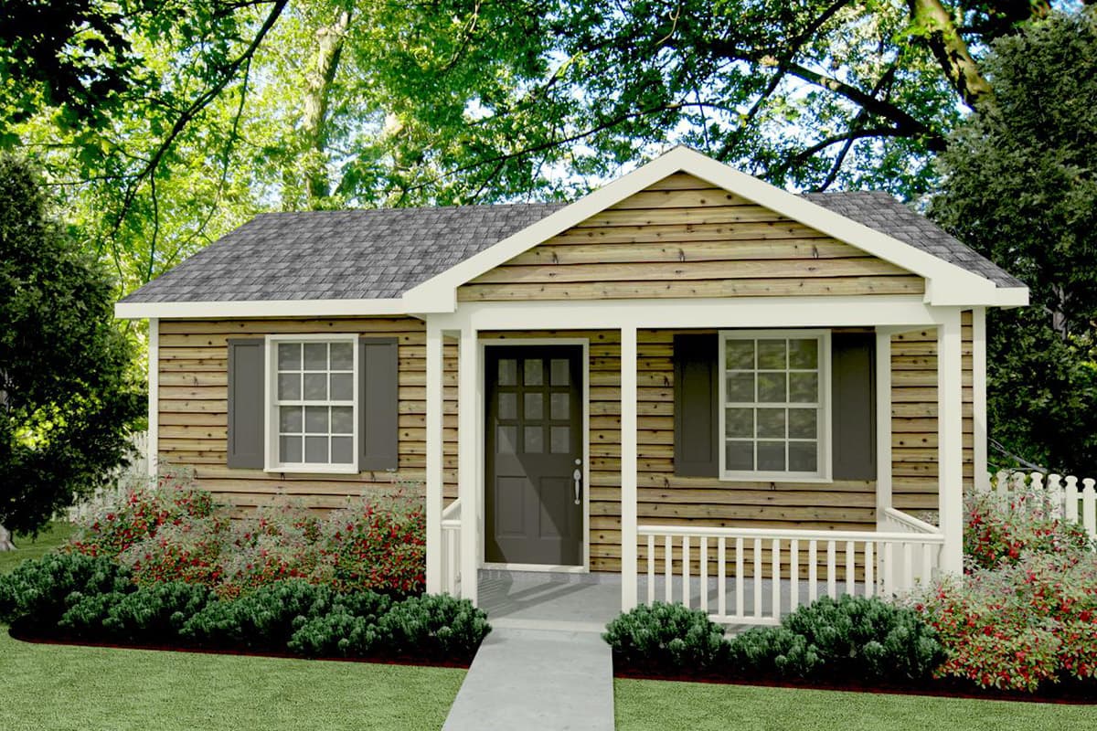 House plan exterior: one-story cottage with wood siding, gable roof, covered porch, and two double-hung windows.