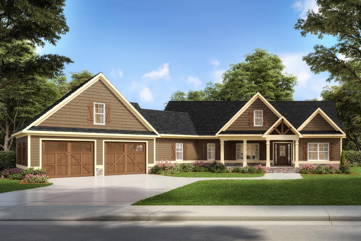 House plan exterior. Ranch style with a two-car garage, front porch, and multiple gables. Features include shake siding and a prominent roofline.