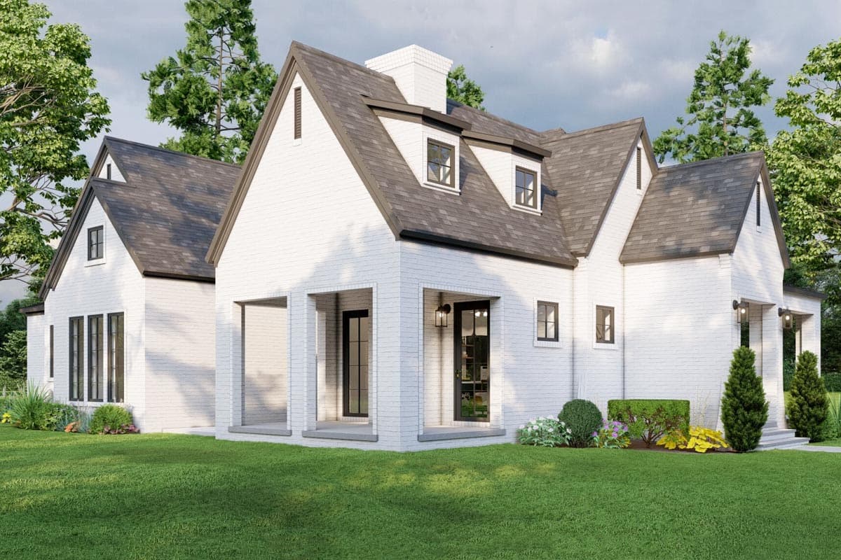 House plan exterior: Modern Farmhouse style with white brick, gabled dormers, covered porches, and a prominent chimney.
