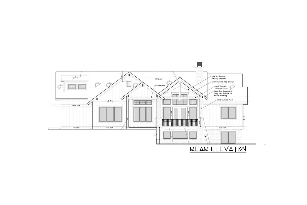 Rear elevation drawing of a house plan featuring gabled rooflines, dormers, and a balcony.